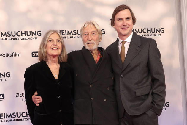Angela Winkler, Wigand Witting, and Lars Eidinger attend the premiere of *Heimsuchung: The Beloved* at Kino International on October 6, 2026, in Berlin, Germany. *Heimsuchung: The Beloved* premiere in Berlin, Germany