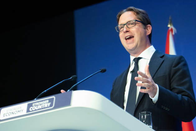 October 6, 2026, Birmingham, United Kingdom: Alex Burghart Shadow Secretary of State for Northern Ireland addresses the audience. The session Defending Britain in a More Dangerous World took place on the main stage at the Conservative Party Conference at the ICC Birmingham. It featured key shadow cabinet figures including Tom Tugendhat, Helen Whately , James Cartlidge, and Alex Burghart , as well as a performance by St Mary s Ukrainian School choir. They were also joined by Yehor Cherniev, Ukrainian MP and Professor Niall Ferguson Birmingham United Kingdom - ZUMAs197 20261006_aaa_s197_106 Copyright: xGaryxRobertsx