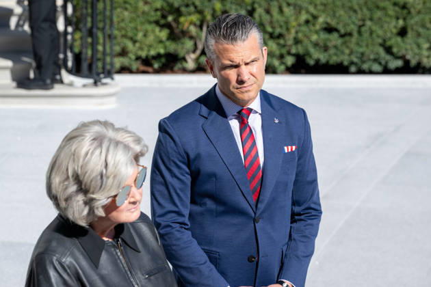 October 6, 2026, Washington, District Of Columbia, United States: White House Chief of Staff SUSIE WILES and Secretary of War PETE HEGSETH watch as President DONALD TRUMP speaks to reporters on the South Lawn of the White House before departing for Baltimore, Maryland. Washington United States - ZUMAk206 20261006_znp_k206_017 Copyright: xMattxKaminskyx