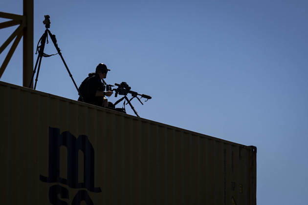 A member of US Secret Service Counter Sniper (CS) keeps watch during an event at Tradepoint Atlantic in Sparrows Point, Maryland on Tuesday, Oct. 6, 2026. Anduril is in advanced talks to build an autonomous surface-vessel factory at Tradepoint Atlantic, which would give the company an East Coast hub alongside its Foss Maritime shipyard in Seattle and undersea-vehicle factory at Quonset Business Park in Rhode Island. BAL20261006101 AlxDrago