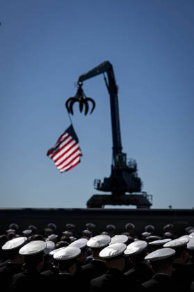 Members of the Navy listen during an event at Tradepoint Atlantic in Sparrows Point, Maryland on Tuesday, Oct. 6, 2026. Anduril is in advanced talks to build an autonomous surface-vessel factory at Tradepoint Atlantic, which would give the company an East Coast hub alongside its Foss Maritime shipyard in Seattle and undersea-vehicle factory at Quonset Business Park in Rhode Island. BAL20261006103 AlxDrago