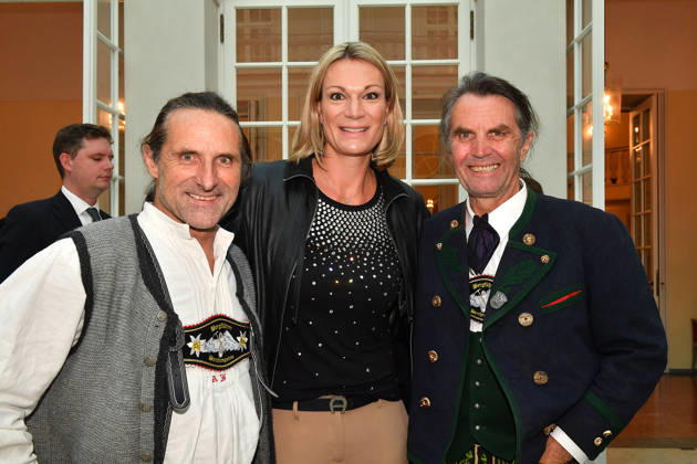 Alexander Huber, Maria Riesch, and Thomas Huber (the Huber brothers) at the presentation of the Bavarian State Medal for Social Merit at the All Saints Court Church (Allerheiligen Hofkirche) in the Residenz on October 6, 2026, in Munich,