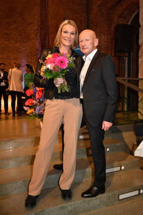 Maria Höfl Riesch and Johann Schrempf at the presentation of the Bavarian State Medal for Social Merit at the All Saints Court Church, Residenz on October 6, 2026, in Munich. Maria Riesch and Johann Schrempf attend the presentation of the Bavarian State Medal for Social Mer