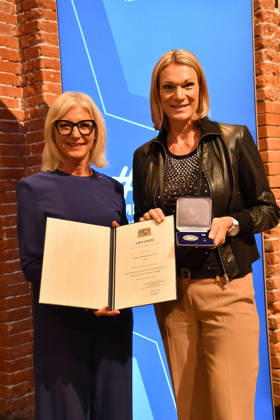 Bavarian State Minister Ulrike Scharf and award recipient Maria Riesch at the presentation of the Bavarian State Medal for Social Merit in the All Saints Court Church, Residenz on October 6, 2026, in Munich