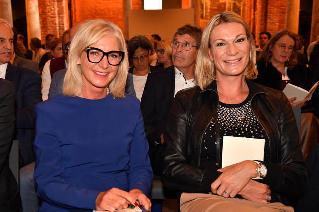 Bavarian State Minister Ulrike Scharf and award recipient Maria Riesch at the presentation of the Bavarian State Medal for Social Merit at the All Saints Court Church, Residenz on October 6, 2026, in Mun
