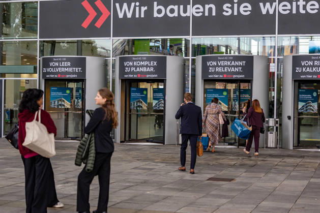 EXPO REAL 2026 in Munich, October 5, 2026: Trade visitors on their way to the exhibition halls at the Messe München grounds. First day of EXPO REAL 2026, the international trade fair for real estate, investments, and infrastructure will take place in Munich from October 5 to 7, 2026, bringing to