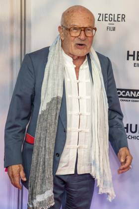 ABB HEIMSUCHUNG: Volker Schloendorff walks the red carpet at the German premiere of his film *Heimsuchung* at the Kino International on October 6, 2026, in Berlin, Germany