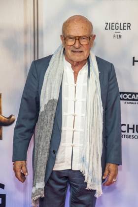 ABB HEIMSUCHUNG: Volker Schloendorff walks the red carpet at the German premiere of his film *Heimsuchung* at the Kino International on October 6, 2026, in Berlin, Germany
