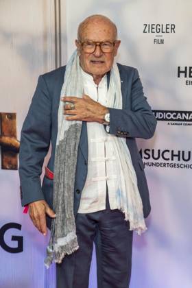 ABB HEIMSUCHUNG: Volker Schloendorff walks the red carpet at the German premiere of his film *Heimsuchung* at the Kino International on October 6, 2026, in Berlin, Germany