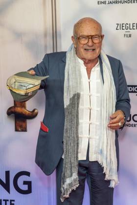 ABB HEIMSUCHUNG: Volker Schloendorff walks the red carpet at the German premiere of his film *Heimsuchung* at the Kino International on October 6, 2026, in Berlin, Germany
