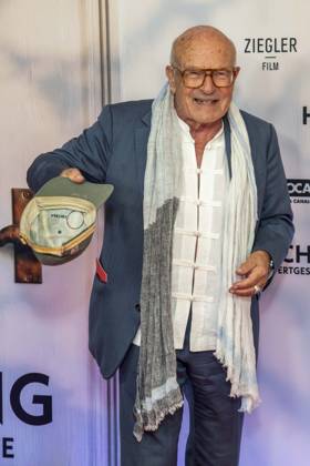 ABB HEIMSUCHUNG: Volker Schloendorff walks the red carpet at the German premiere of his film *Heimsuchung* at the Kino International on October 6, 2026, in Berlin, Germany