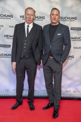 ABB HEIMSUCHUNG: Ludger Pistor and Jan Christoph Wagner appear on the red carpet at the German premiere of Volker Schloendorff’s film *Heimsuchung* at the Kino International on October 6, 2026, in Berlin, Germany