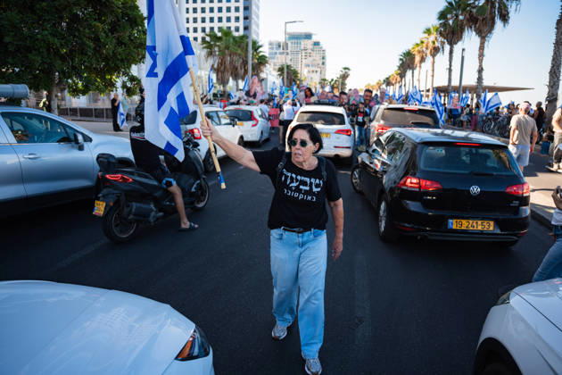 October 7, 2026, Tel Aviv, Tel Aviv, Israel: A protester blocks the road near the beach in protest against the Israeli government on the third anniversary of October 7th. Tel Aviv Israel  - ZUMAg280 20261007_znp_g280_005 Copyright: xYoavxGinsburgx