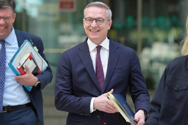 Statement by the Federal Minister for Digital Affairs on Government Modernization: Dr. Karsten Wildberger, looking energetic with a folder in hand, on his way to deliver his statement on the Cabinet’s decision regarding the report on one year of government modernization, Berlin, October 7, 2026, Berlin, Berlin, Germany
