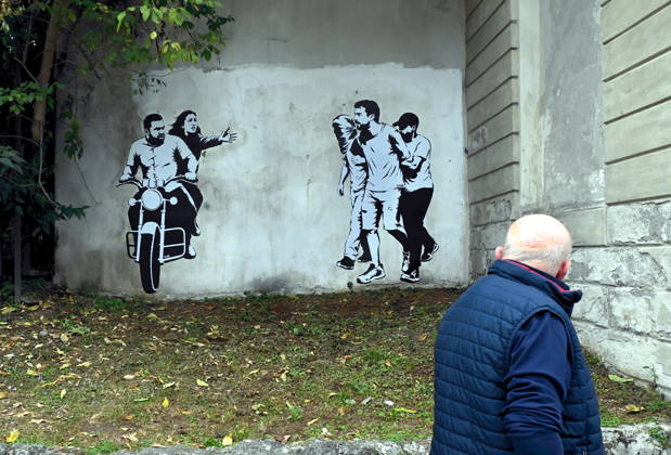 IPA89393691 - MILAN - October 7, 2026 - A mural by Alexandro Palombo, an artwork on display on October 7 at the Museum of Modern Art, located at 16 Via Palestro, dedicated to the young couple kidnapped during the attack on the Nova Music Festival Copyright: xMaurizioxMaulex xMaurizioxMaulex IPA89393691