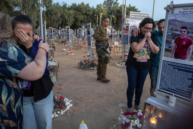 Israelis mourn at sunrise in the Re im memorial on the third anniversary where Hamas massacred 364 people and took another 40 hostages during the Nova dance party on October 7, 2023, near Kibbutz Re im, southern Israel on Wednesday, October 7, 2026. The Hamas cross-border attacks resulted in the deaths of approximately 1,200 people and the abduction of 251 hostages. ISR202606080027 JimxHollander