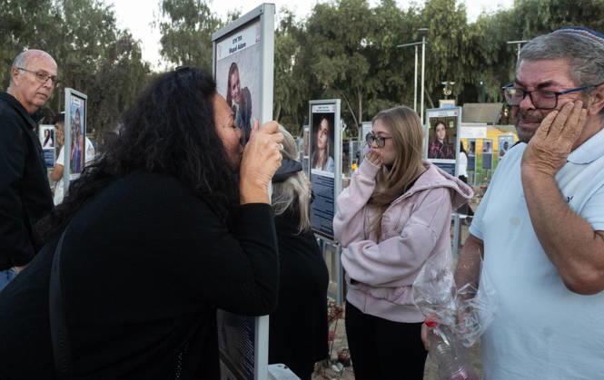 Israelis mourn at sunrise in the Re im memorial on the third anniversary where Hamas massacred 364 people and took another 40 hostages during the Nova dance party on October 7, 2023, near Kibbutz Re im, southern Israel on Wednesday, October 7, 2026. The Hamas cross-border attacks resulted in the deaths of approximately 1,200 people and the abduction of 251 hostages. ISR202606080028 JimxHollander