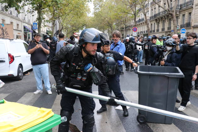 Student blockade near Sciences Po Paris PARIS, FRANCE - OCTOBER 7: A heavy police presence is deployed at the scene as students denounce conditions in the education system and express solidarity with mobilized high school students in Paris, France, on October 7, 2026. Students gather behind makeshift barricades made of trash bins and metal barriers near Sciences Po Paris as part of ongoing mobilization linked to the broader high school and university protest movement. Umit Donmez Anadolu Paris France. Editorial use only. Please get in touch for any other usage. Copyright: x2026xAnadoluxUmitxDonmezx