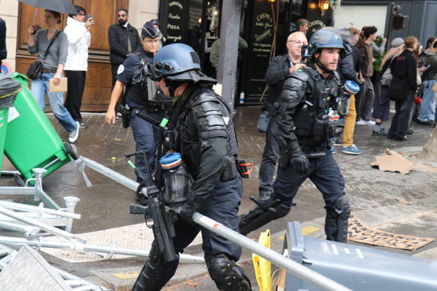 Student blockade near Sciences Po Paris PARIS, FRANCE - OCTOBER 7: A heavy police presence is deployed at the scene as students denounce conditions in the education system and express solidarity with mobilized high school students in Paris, France, on October 7, 2026. Students gather behind makeshift barricades made of trash bins and metal barriers near Sciences Po Paris as part of ongoing mobilization linked to the broader high school and university protest movement. Umit Donmez Anadolu Paris France. Editorial use only. Please get in touch for any other usage. Copyright: x2026xAnadoluxUmitxDonmezx