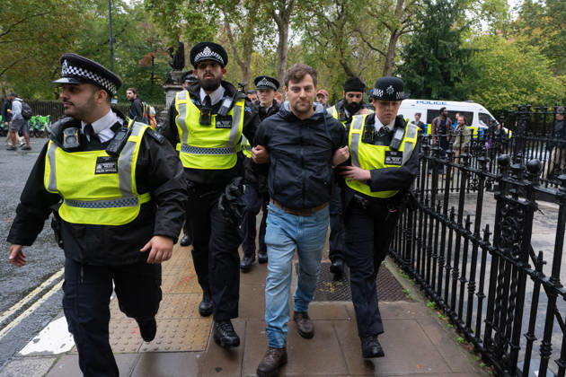 Pro-Palestinian protesters march In London LONDON, UNITED KINGDOM - OCTOBER 7: Police officers detain a Pro-Palestinian demonstrator during a protest in central London, United Kingdom, on October 7, 2026, marking the third anniversary of the October 7, 2023 attacks. Thomas Krych Anadolu London United Kingdom. Editorial use only. Please get in touch for any other usage. Copyright: x2026xAnadoluxThomasxKrychx