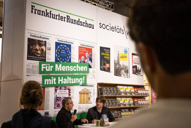 78th Frankfurt Book Fair An interview is taking place at the Frankfurter Rundschau booth at the Frankfurt Book Fair in Frankfurt am Main. The 78th Frankfurt Book Fair will take place from October 7–11, 2026, at the Frankfurt am Main Exhibition Center in Hesse, Germany. 2026-10-07_frankfurter-buchmesse_27