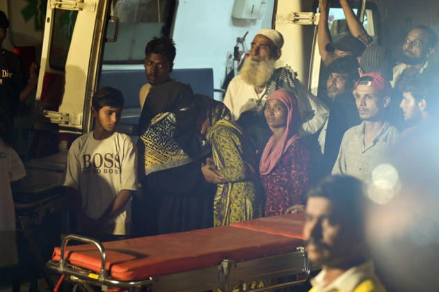 NEW DELHI, INDIA - OCTOBER 7: Mourning family members gather at the site where rescue operations are underway after a four-storey residential building collapsed in the New Seemapuri area of Shahdara on October 7, 2026, in New Delhi, India. The structural collapse occurred around 3:30 PM behind the local fish market, trapping multiple residents under concrete slabs and damaging two adjoining houses. At least one minor died while eight people were rescued and rushed to Rajiv Gandhi Super Speciality Hospital for emergency medical treatment as sniffer dogs and excavators worked late into the evening to locate remaining trapped survivors. (Photo by Raj K Raj Hindustan Times) 3 Dead, Eight Injured In 5 Storey Building Collapses In New Seemapuri O