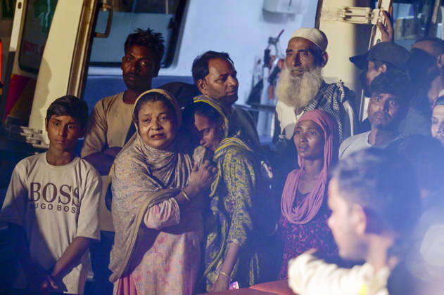 NEW DELHI, INDIA - OCTOBER 7: Mourning family members gather at the site where rescue operations are underway after a four-storey residential building collapsed in the New Seemapuri area of Shahdara on October 7, 2026, in New Delhi, India. The structural collapse occurred around 3:30 PM behind the local fish market, trapping multiple residents under concrete slabs and damaging two adjoining houses. At least one minor died while eight people were rescued and rushed to Rajiv Gandhi Super Speciality Hospital for emergency medical treatment as sniffer dogs and excavators worked late into the evening to locate remaining trapped survivors. (Photo by Raj K Raj Hindustan Times) 3 Dead, Eight Injured In 5 Storey Building Collapses In New Seemapuri O