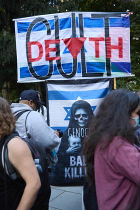 October 7, 2026, New York, New York, USA: A protester holds a sign bearing the word DEATH during a pro-Palestinian rally at City Hall Park in New York City, New York. New York USA - ZUMAs237 20261007_aap_s237_019 Copyright: xMarkxJ.xSullivanx