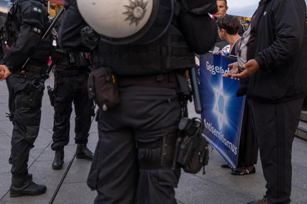 October 7, 2026, Cologne, Nrw, Germany: Multiple hundreds of people took part in a demonstration in Cologne marking the third anniversary of October 7, 2023, protesting IsraelÃ¢â‚¬â ¢s military campaign and genocidal intervention in Gaza. A smaller counter-protest took place without reported confrontations between the two groups...Police intervened and stopped the demonstration multiple times before protesters were held inside a police cage for approximately two hours. Officers later opened a corridor and allowed them to leave in small groups. During the dispersal, police arrested around 10 protesters, who were later released from custody. Cologne Germany - ZUMAm356 20261007_zip_m356_004 Copyright: xMouafakxMahmaljix
