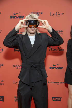 ABB ABOUTYOU Ski Aggu as a guest on the orange carpet at the ABOUT YOU Opera Fashion Show at the Admiralspalast on October 7, 2026, in Berlin, Germany