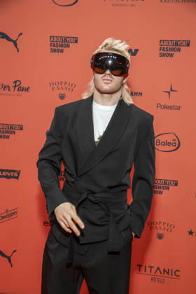 ABB ABOUTYOU Ski Aggu as a guest on the orange carpet at the ABOUT YOU Opera Fashion Show at the Admiralspalast on October 7, 2026, in Berlin, Germany
