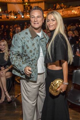 ABB ABOUTYOU Guido Maria Kretschmer and Caroline Daur attend the ABOUT YOU Opera Fashion Show at the Admiralspalast on October 7, 2026, in Berlin, Germany