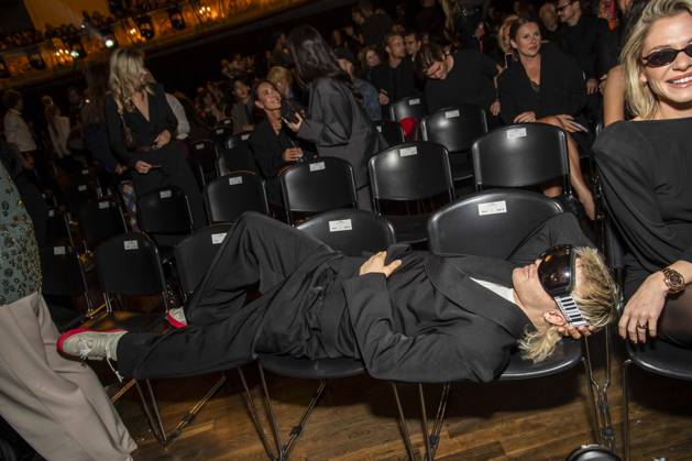 ABB ABOUTYOU Ski Aggu is seated in the audience at the ABOUT YOU Opera Fashion Show at the Admiralspalast on October 7, 2026, in Berlin, Germany