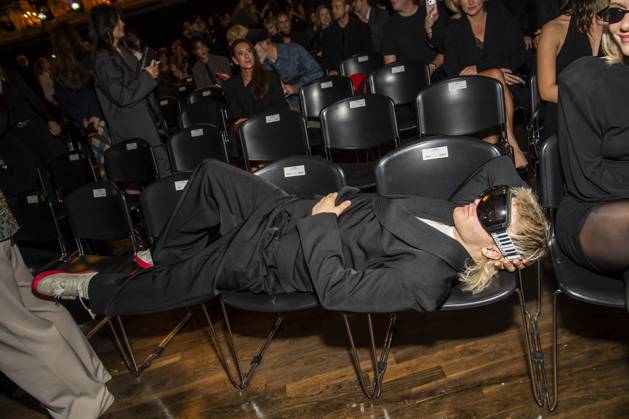 ABB ABOUTYOU Ski Aggu is seated in the audience at the ABOUT YOU Opera Fashion Show at the Admiralspalast on October 7, 2026, in Berlin, Germany