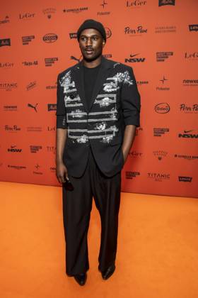 ABB ABOUTYOU Marvin De Graft as a guest on the orange carpet at the ABOUT YOU Opera Fashion Show at the Admiralspalast on October 7, 2026, in Berlin, Germany