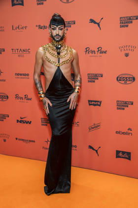 ABB ABOUTYOU Raj Rouge as a guest on the orange carpet at the ABOUT YOU Opera Fashion Show at the Admiralspalast on October 7, 2026, in Berlin, Germany