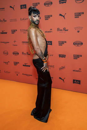 ABB ABOUTYOU Raj Rouge as a guest on the orange carpet at the ABOUT YOU Opera Fashion Show at the Admiralspalast on October 7, 2026, in Berlin, Germany