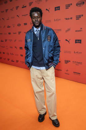 ABB ABOUTYOU Wil Johnson as a guest on the Orange Carpet at the ABOUT YOU Opera Fashion Show at the Admiralspalast on October 7, 2026, in Berlin, Germany