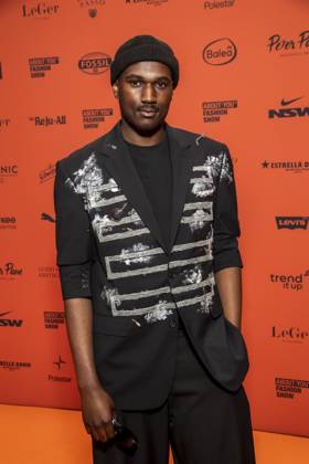 ABB ABOUTYOU Marvin De Graft as a guest on the orange carpet at the ABOUT YOU Opera Fashion Show at the Admiralspalast on October 7, 2026, in Berlin, Germany