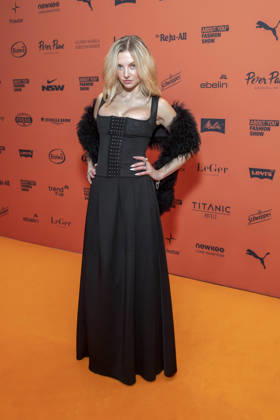 ABB ABOUTYOU Julia Wulf walks the Orange Carpet at the ABOUT YOU Opera Fashion Show at the Admiralspalast on October 7, 2026, in Berlin, Germany