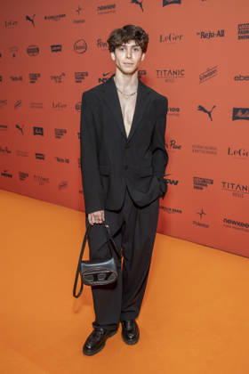 ABB ABOUTYOU Sascha Dombrowski as a guest on the orange carpet at the ABOUT YOU Opera Fashion Show at the Admiralspalast on October 7, 2026, in Berlin, Germany