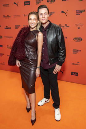 ABB ABOUTYOU Lisa Walser and Henry Walser as guests on the orange carpet at the ABOUT YOU Opera Fashion Show at the Admiralspalast on October 7, 2026, in Berlin, Germany