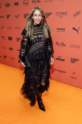 ABB ABOUTYOU Annemarie Carpendale makes a solo appearance on the Orange Carpet at the ABOUT YOU Opera Fashion Show at the Admiralspalast on October 7, 2026, in Berlin, Germany