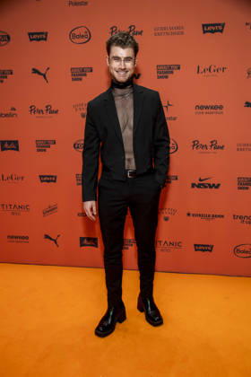 ABB ABOUTYOU s Linus Weber as a guest on the orange carpet at the ABOUT YOU Opera Fashion Show at the Admiralspalast on October 7, 2026, in Berlin, Germany
