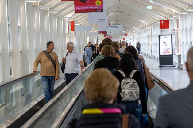 Frankfurt Book Fair 2026, August 10, 2026: Visitors to the 2026 Frankfurt Book Fair making their way through the connecting corridors to the exhibition halls at the Frankfurt Exhibition Center. Frankfurt Book Fair, second day of the fair for trade visitors, 2026, Thursday Frankfurt am Main, Messe Hessen, Germany