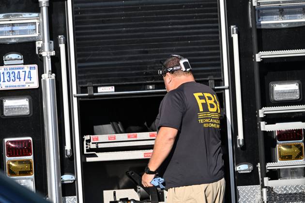 October 7, 2026, Philadelphia, Pennsylvania, USA: FBI agents seize evidence from the home of Eugene Horsch on West Chew Avenue in Philadelphia, Pennsylvania, United States, on October 7, 2026. Several evidence boxes and bags are visible, including one labeled drain trap and liquid contents. Authorities are investigating the property after linking it to at least seven missing women. Eugene Horsch is the son of the late Raymond R.C. Horsch. Philadelphia USA - ZUMAs197 20261007_aaa_s197_641 Copyright: xKylexMazzax