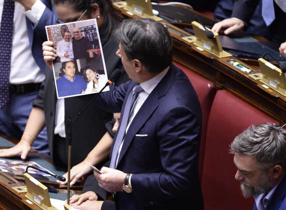 IPA89426082 - Rome, Chamber of Deputies: Electoral Law, explanations of vote, and final vote; in the photo, Giuseppe Conte holds up a picture showing Delmastro with Caroccia and Chiara Colosimo with Ciavardini  Copyright: xSTEFANOxCAROFEIx xSTEFANOxCAROFEIx xFOTOGRAMMAx IPA89426082