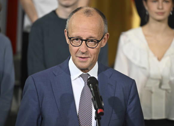 German Chancellor Friedrich Merz, British Prime Minister Andy Burnham attend Kensington Treaty ratification ceremony in Berlin BERLIN, GERMANY - OCTOBER 08: German Chancellor Friedrich Merz delivers a speech during a ceremony marking the exchange of instruments of ratification of the Kensington Treaty at the Federal Chancellery in Berlin, Germany, on October 08, 2026. German Chancellor Friedrich Merz also attends the ceremony. Halil Sagirkaya Anadolu Berlin Germany. Editorial use only. Please get in touch for any other usage. Copyright: x2026xAnadoluxHalilxSagirkayax