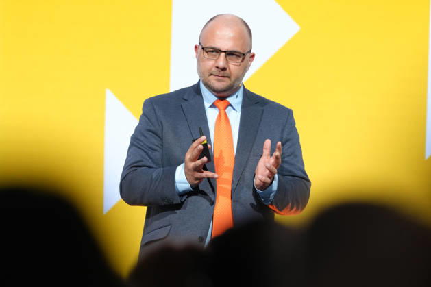 Brand Economy Day 2026: Author and speaker Stefan Kolev on stage during his keynote address at Brand Economy Day 2026, Berlin, October 8, 2026, Berlin, Berlin, Germany