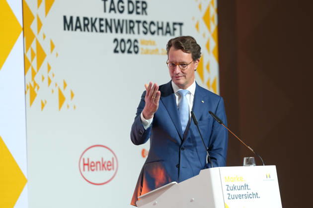 Brand Economy Day 2026 NRW: Minister President Hendrik Wuest on stage delivering his laudatory speech for Tim Hottges, winner of the Mensch Marke award, at Brand Economy Day 2026, Berlin, October 8, 2026, Berlin, Germany